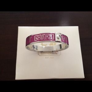 Coach Poppy silver and pink bangle.