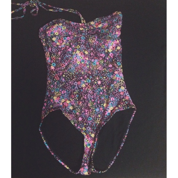 One piece swim suite with bright flowers
