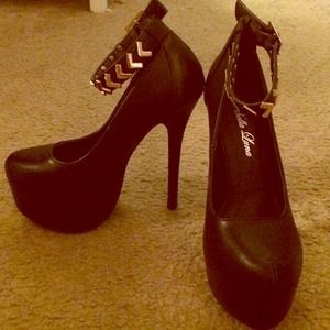 Black 6 inch heels w/ gold arrow style strap