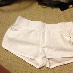 White beach shorts