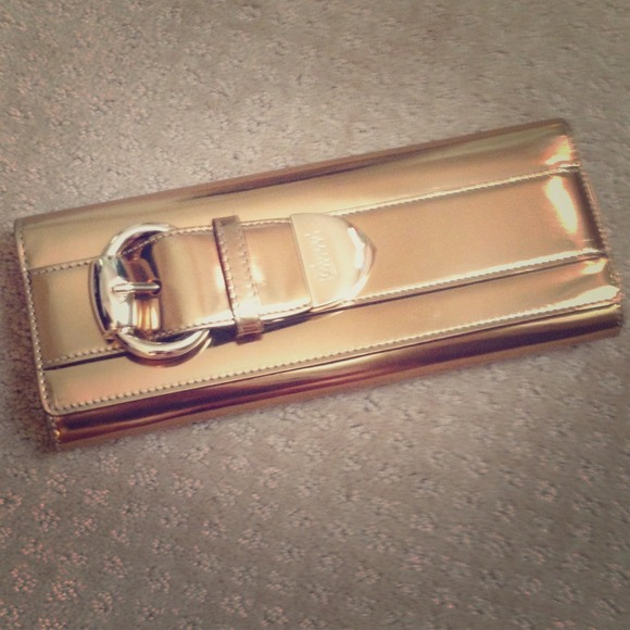 Authentic, gold Gucci Clutch