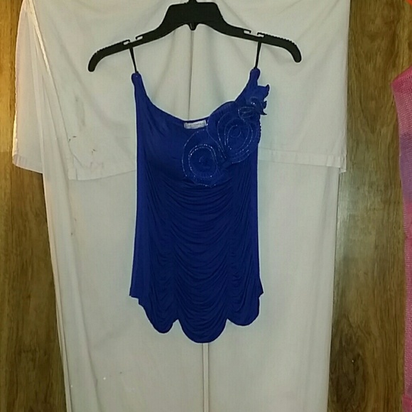 Blue go out shirt with a rose On it