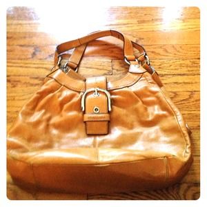 Coach leather satchel. Loads of compartments!