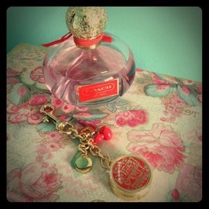 Coach poppy solid purfume/key chain- unused