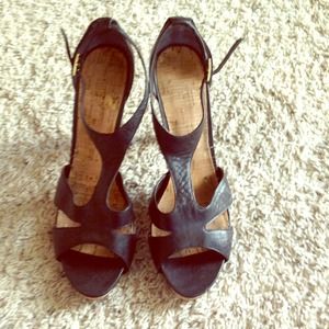 Comfy strappy black heels.