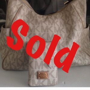 Authentic Michael Kors wallet - ( wallet only)
