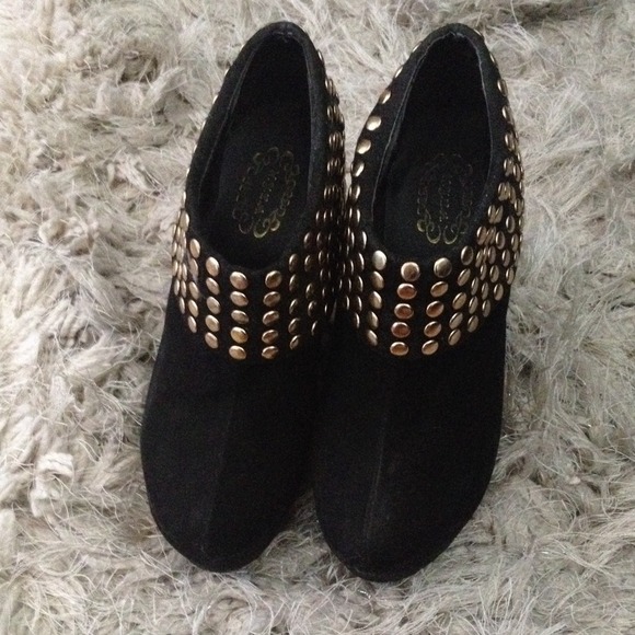 Black and gold wedge booties