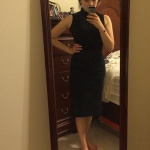 Black Prada skirt w/ buckle and red stitch accents