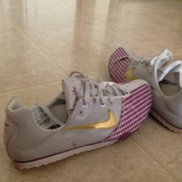 purple and gold track spikes