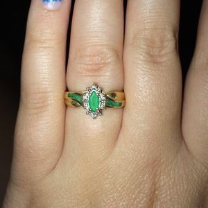 Beautiful gold an emerald And purple opal rings