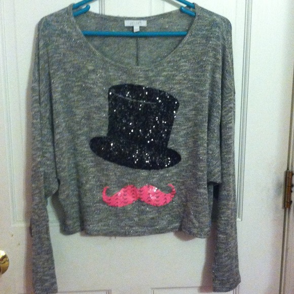 Sparkly gray sweater with mustache and top hat