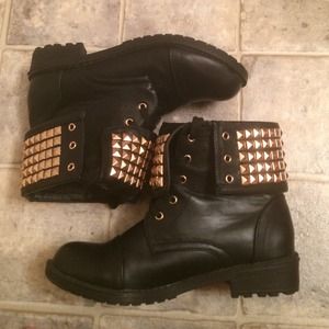 Black booties w/ gold studs.