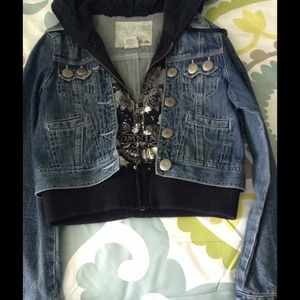 Cute jean jacket with sweatshirt underneath.