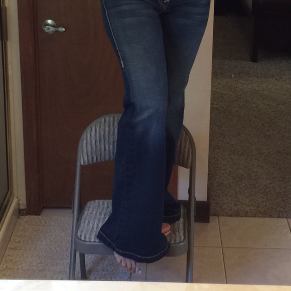 Bell bottom style jeans. Inseam is 33