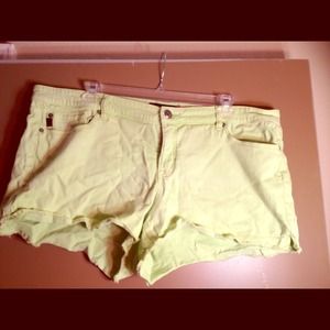 Neon green torrid shorts.