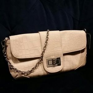 Express nude clutches with silver chain