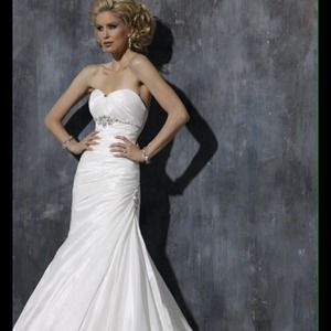 Maggie Sotero wedding gown. NEW. Never been worn.