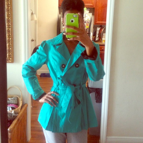 Green double breasted coat.