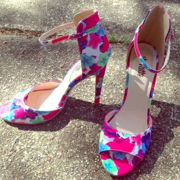 Floral heels with a strap.