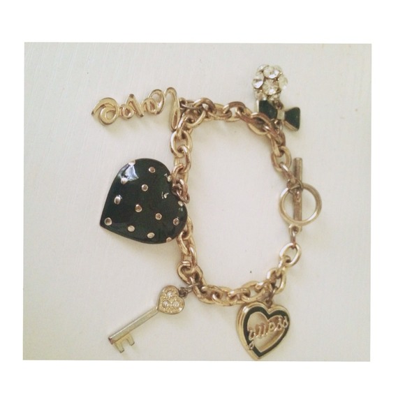 GUESS gold/black charm bracelet