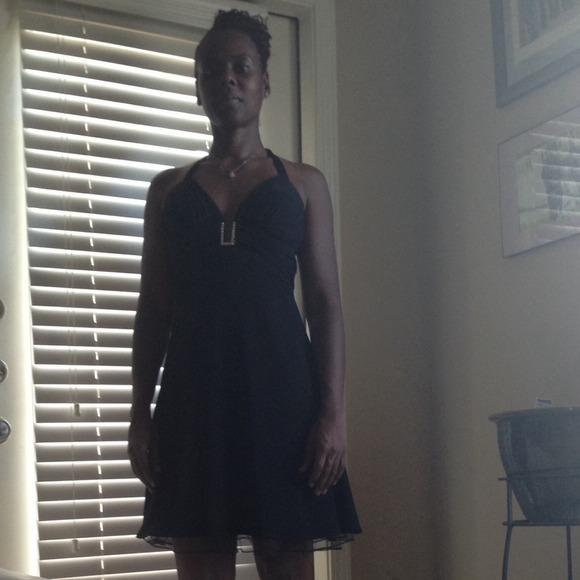 Black cocktail dress.. I'm cleaning out my closet.