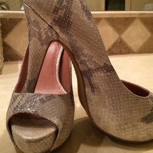 Vince Camuto snakeskin peep toe pumps