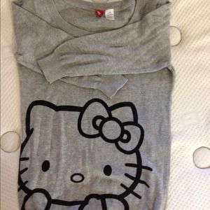 Gray hello kitty sweater.