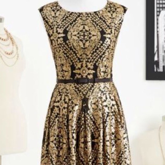 Eva Mendes Co- black and gold sequin dress