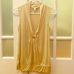 Silky cream colored sleeveless blouse