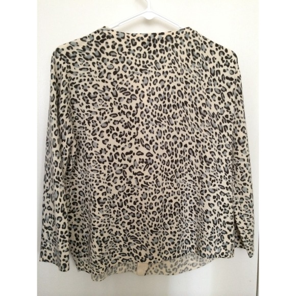 This is a medium sleeve cardigan sweater. - Picture 2 of 2