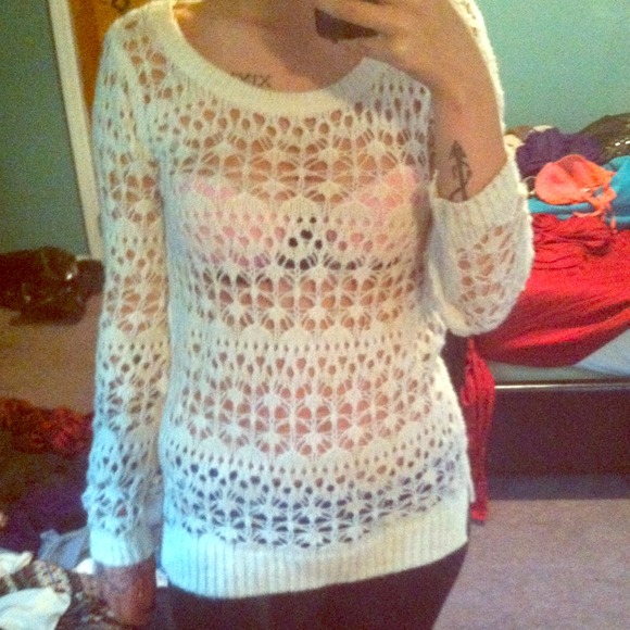 Medium length white knit sweater