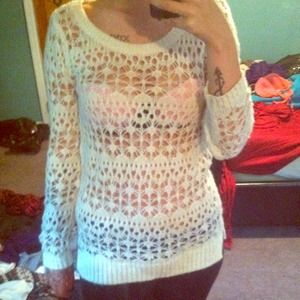 Medium length white knit sweater