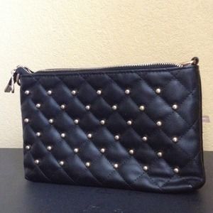 Black and gold leather clutch bag