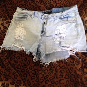 Ripped light blue shorts