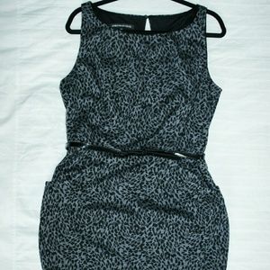 Black and grey office dress w/ a little attitude.