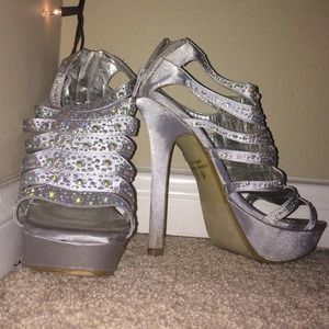Silver stilettos with jewels.