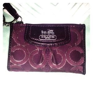 Purple Coach mini keychain wallet