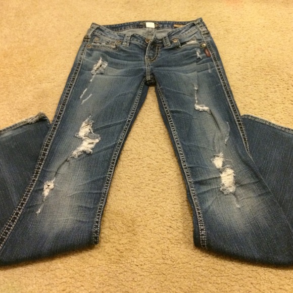 Destructed Silver Jeans Flare with side vents