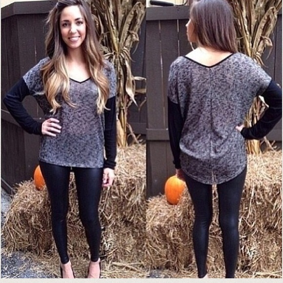 Grey and black long sleeve top.