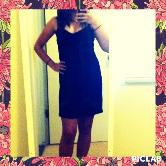 Black dress with crisscross straps in the back