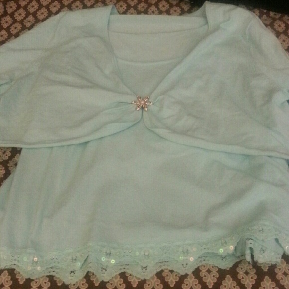 A nice sweater like tank top with a half shirt