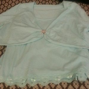 A nice sweater like tank top with a half shirt