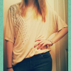 A lose creme blouse.