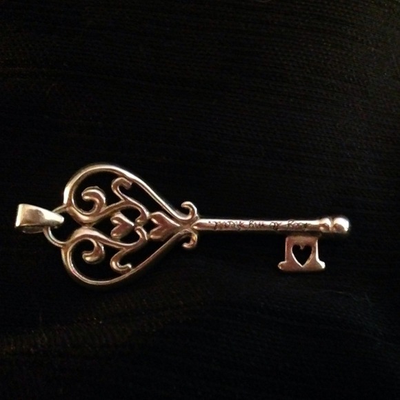 This is a Sterling Key Charm