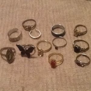 Lot of rings and couple toe rings on hold