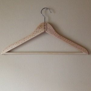 Beautiful hand etched wooden hangers.