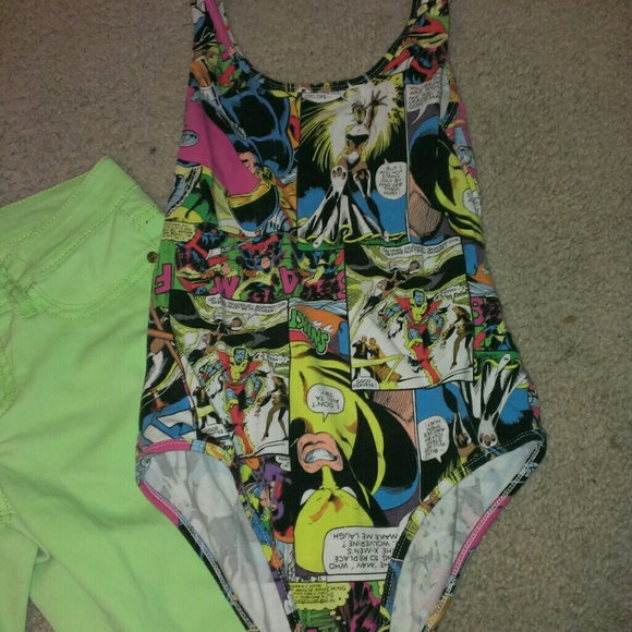 Comic book body suit and lime green skinny pants