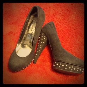 Black studded pumps
