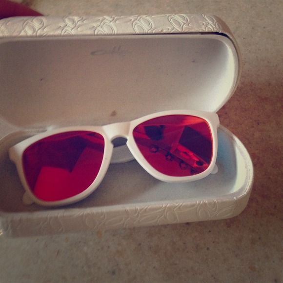 White and pink Oakley frog skins