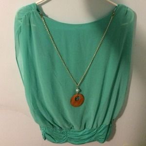 teal loose top with included necklace